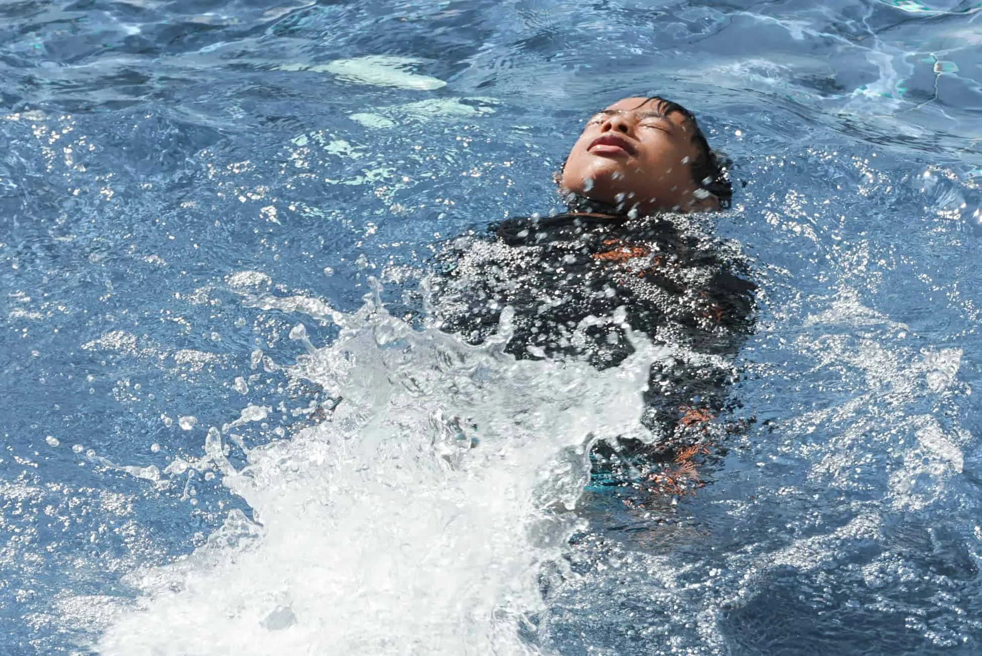 Child in a swimming lesson